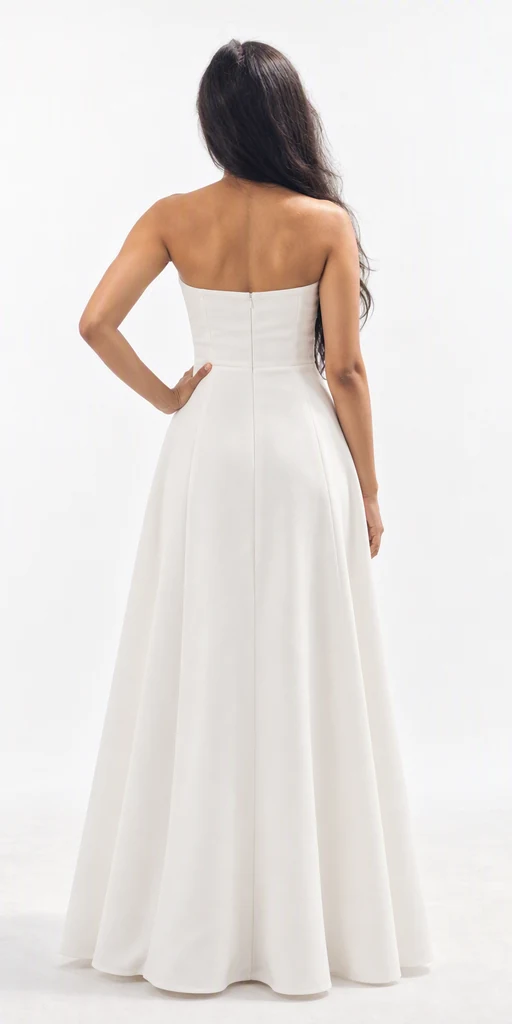 Back view of Harshitha in a plain white floor-length dress. Approved AI visualization created from her actual reference photos.